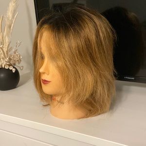 Mannequin doll head to practice styles on